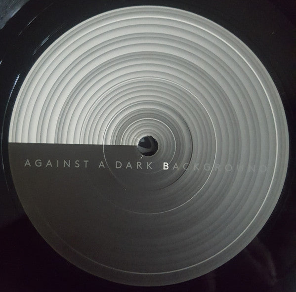 Against A Dark Background | Mint (M) Mint (M)--Classic Vinyl Record